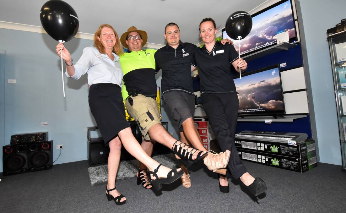 Radio Rentals' Sharon Lowe, Ben Harvey, Jade Holstein and Allison Cope stepping up in heels to end violence against women.