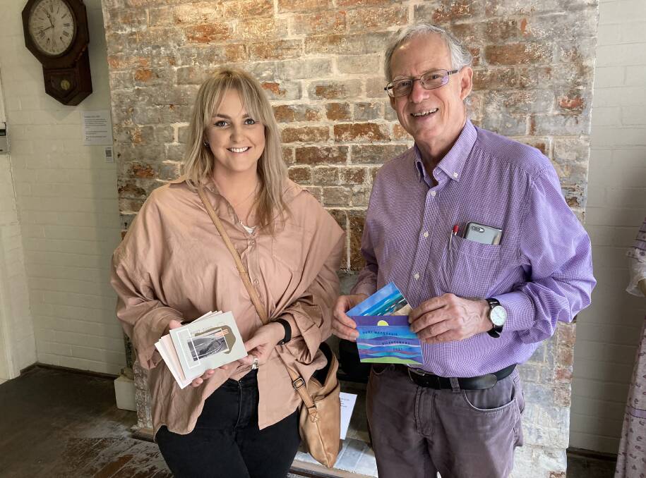 Picture perfect: CSU graphic design student Chaney Boyle and Port Macquarie Historical Society president, Clive Smith.