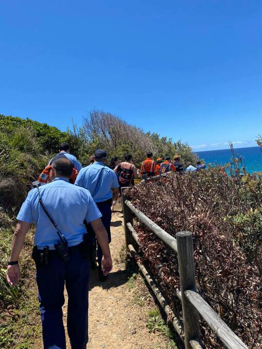 The woman was taken to hospital for assessment after being assisted off the beach by SES personnel. Photo: ALS lifeguards.