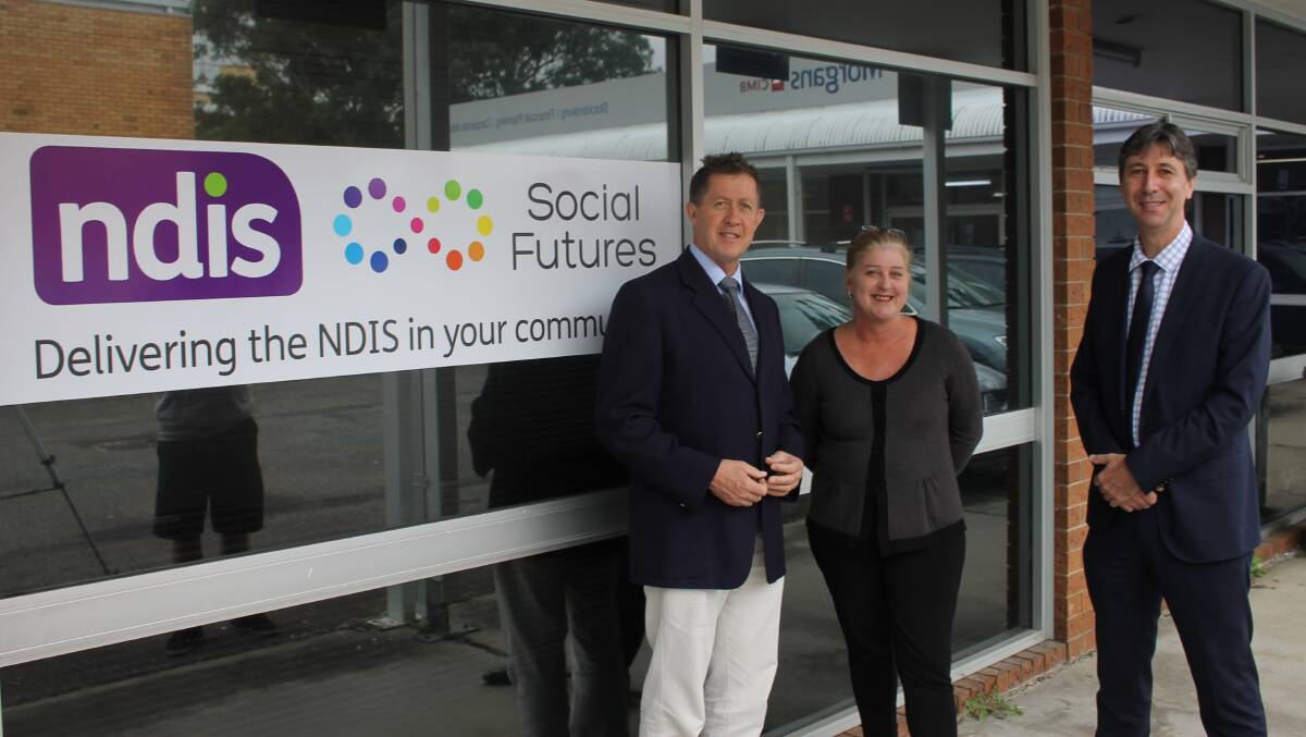 Milestone: Luke Hartsuyker with Ruth Thompson, CEO of Mid Coast Communities, and Tony Davies, CEO of Social Futures, out front of the new office in Coffs Harbour.