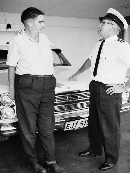 Reunited: Ambulance Officer Neville Stanton checks over Robert Phillips following his surgeries for a gun shot wound to the head, 1968.