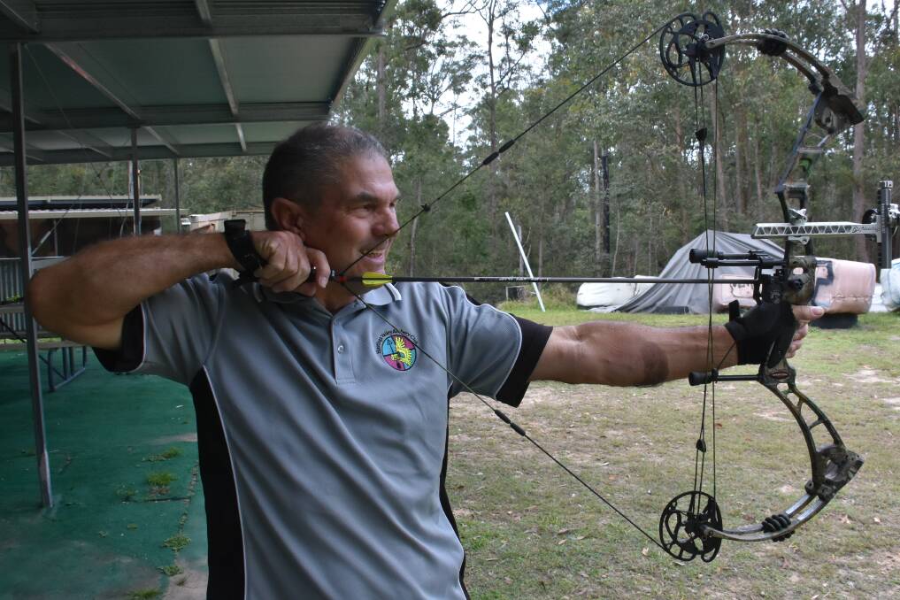 AT FULL DRAW: Geoff Drew practising at the Hastings Valley Archery Club.
