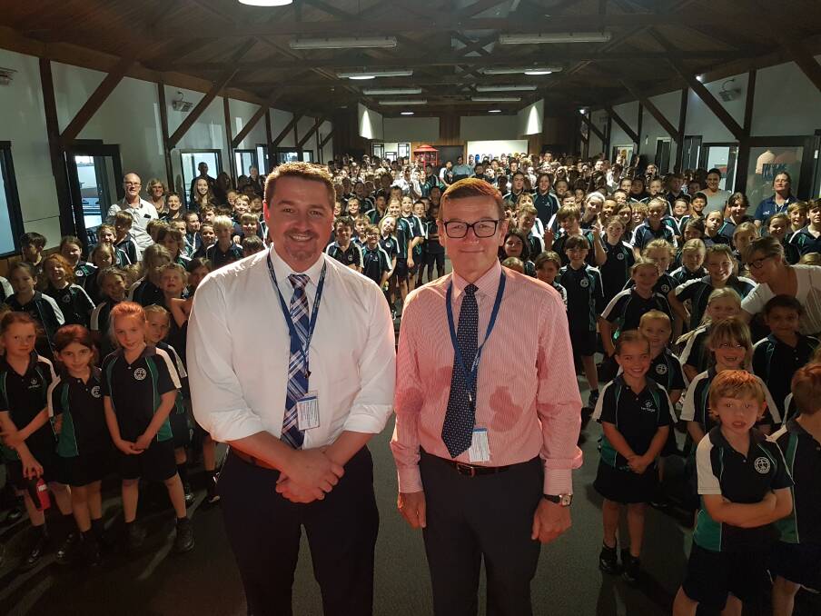 CELEBRATION OF DEVELOPMENT: Federal Member for Cowper, Pat Conaghan with Heritage Christian School principal Geoff Brisby and students.