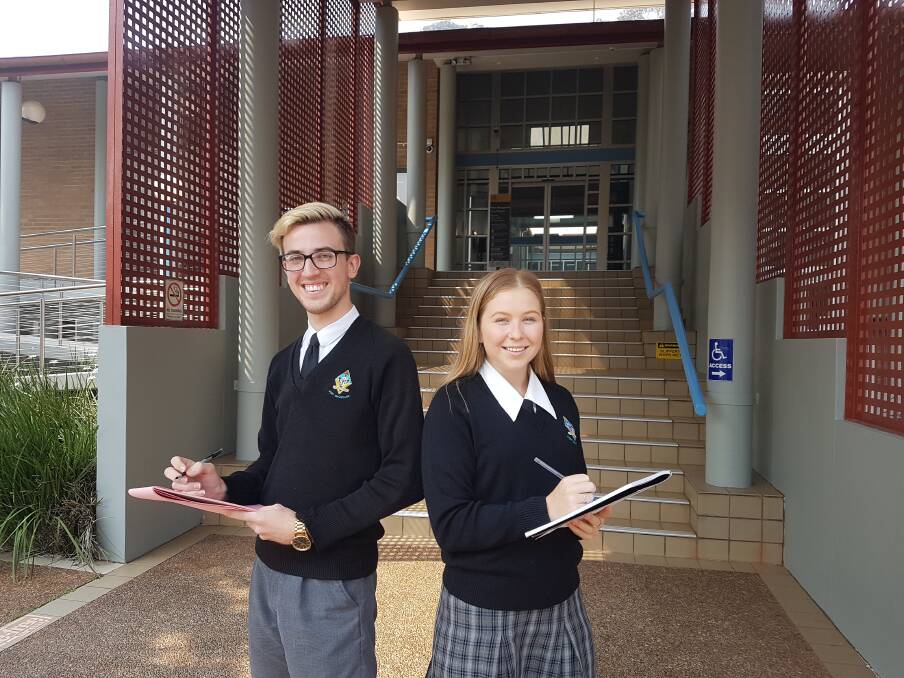 TAKING NOTES: Year 12 students Cory Baker and Elise Smith at the Port Macquarie Court House on September 12.