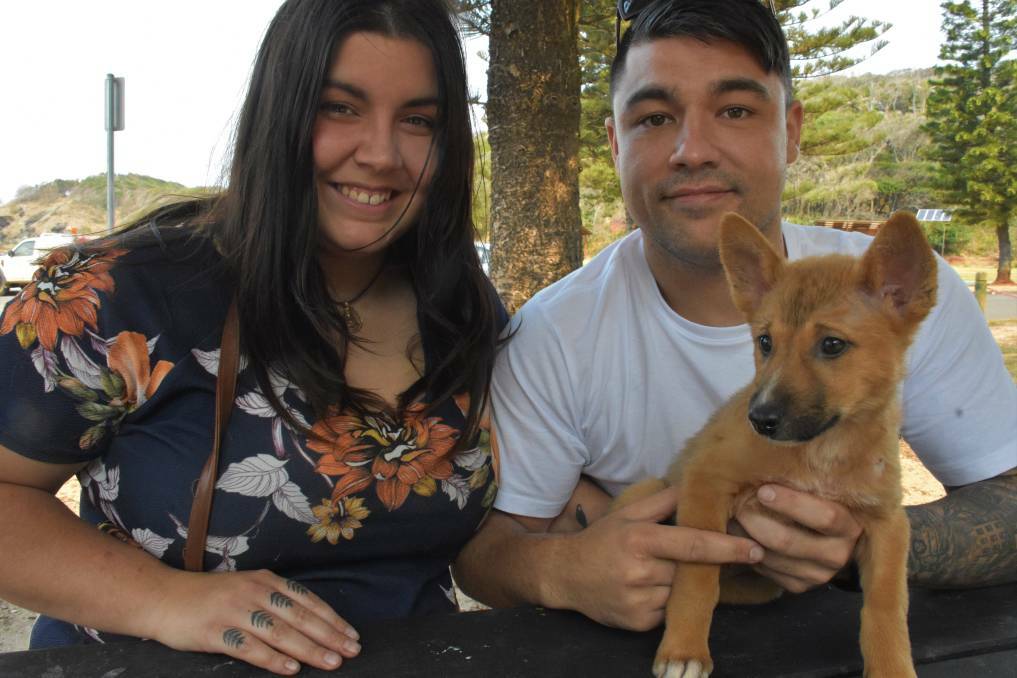 COMPASSION MISSION: Port Macquarie siblings, Eathan Watts and Sarah Kirkman with rescued pup, Barkala, in 2019.