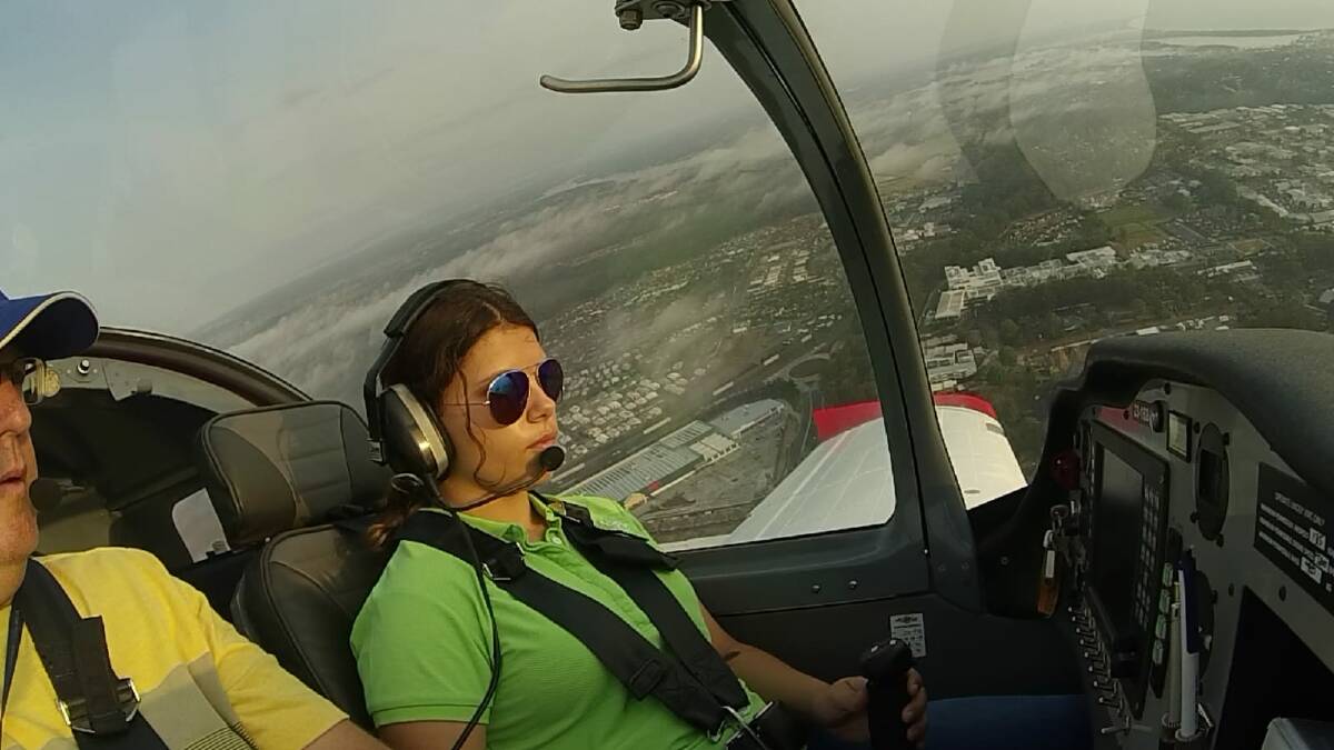 ON THE AIR: Scholarship recipient Dior Toppazzini flying with instructor Mike Bullock. Photo: HDFC.