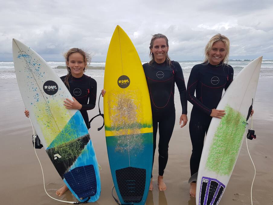 SURFS UP: Avalon, Loren and Imojen at the Mid North Coast Girls Surf Classic on Rainbow Beach.