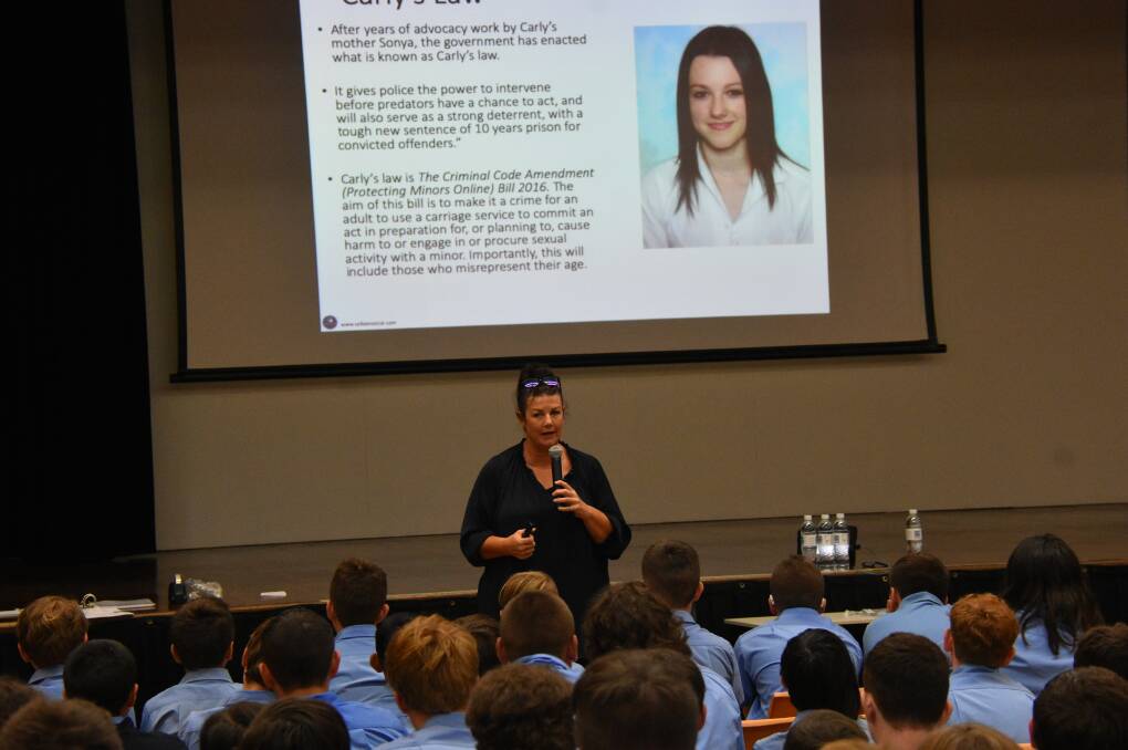 TOUGH TALK: Social media expert Kirra Pendergast speaking to students in Port Macquarie.