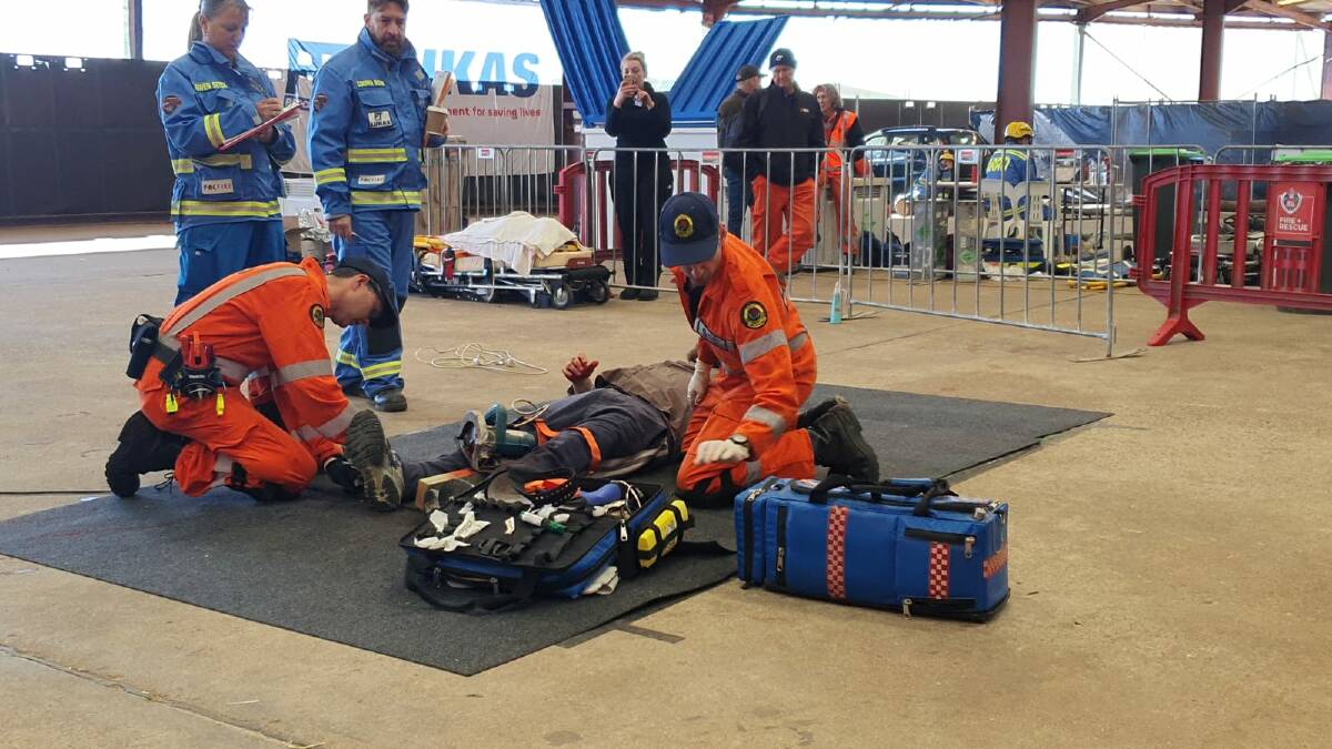 RESCUE: Port Macquarie volunteers in a trauma team at Australasian Road Rescue Challenge in Dubbo. Photo; Supplied/Port Macquarie SES.