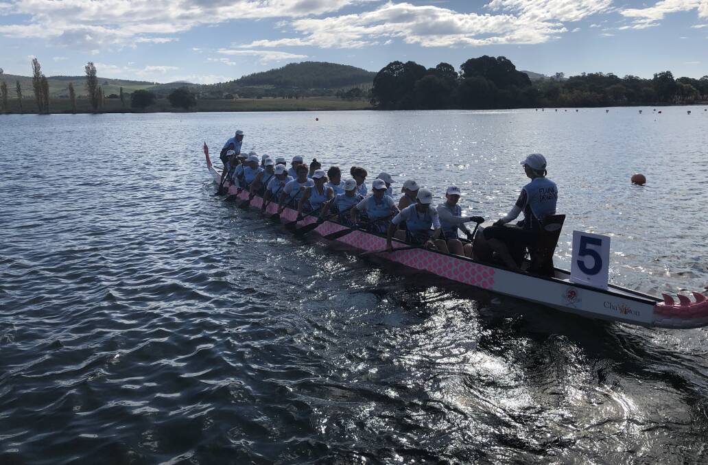 On the water: Flamin' Dragons Port Macquarie prepare to race. Photo: Supplied.