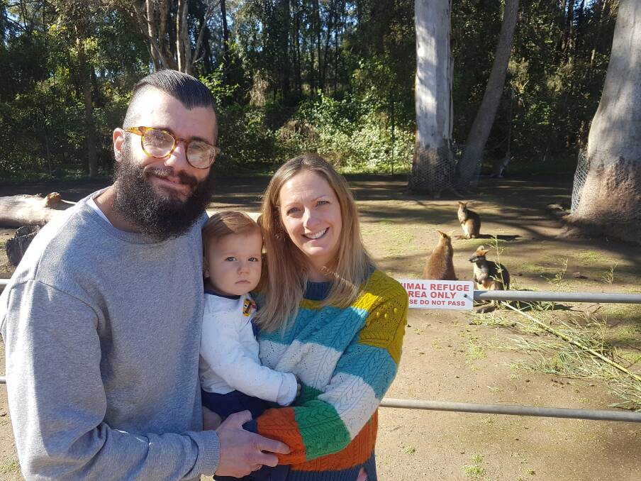 ESCAPING THE CITY: Raphael, Elaine and Samuel George, 1, visiting Billabong Zoo in Port Macquarie.