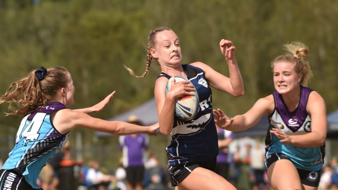 RULE CHANGES: Port Macquarie's Bianca Green evades the Hornsby defence at NSW Junior State Cup 2019. Photo: Paul Jobber