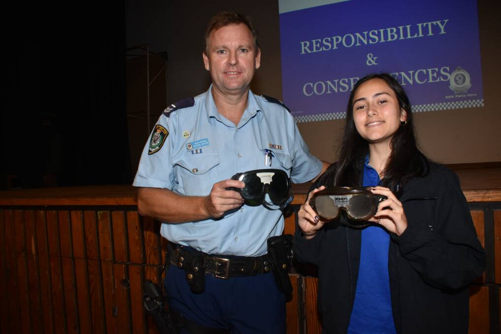 RESPONSIBLE DRIVING: Senior constable Steven Jeffery with Hastings Secondary College student Darlene Riveros.