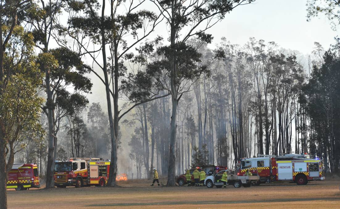 Fire crews on scene: A bush fire in Port Macquarie on July 18.