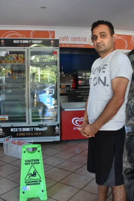 DAMAGED BUT THANKFUL: North Haven service station owner Mukesh Kumar.