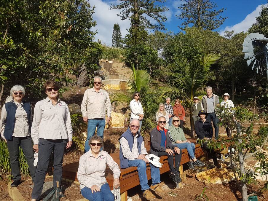 STRONG GROWTH: Volunteers, contributors and friends at Mrs York's Garden opening of the waterfall and footpath.