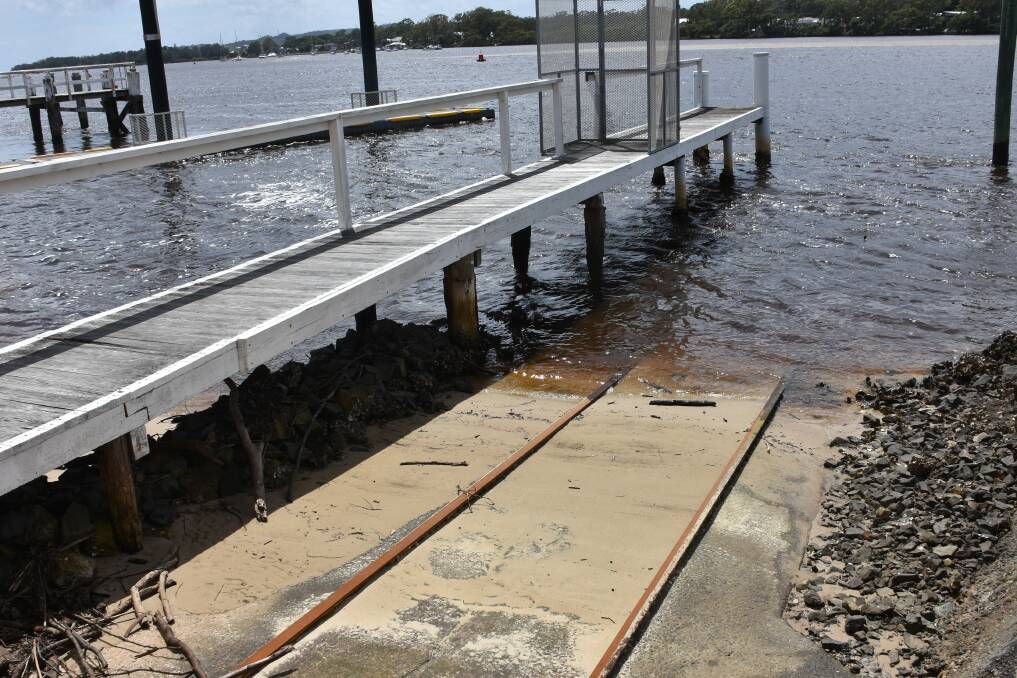 SANDY STOCKPILE: Marine Rescue Camden Haven is asking for assistance to solve a sandy problem blocking their launching ramp.