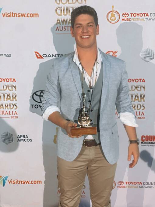 SHOCK AND AWE: Blake O'Connor with his Golden Guitar at the Country Music Awards. Photo: Blake O'Connor Music.