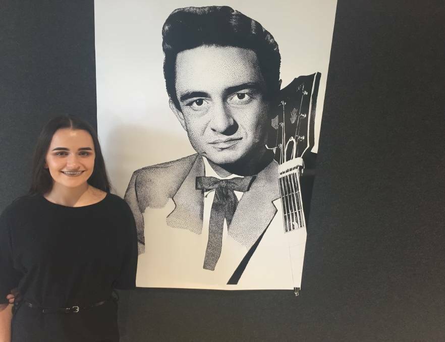  TALENTED: CSU student Kseah Cowan with one of her exhibition pieces, called Johnny Cash, in 2017.