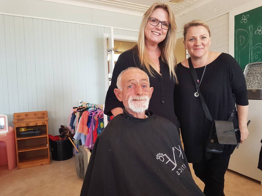LOOKING SHARP: Garry Kemp with hairdressers Evelina Kemp and Liz Robinson.