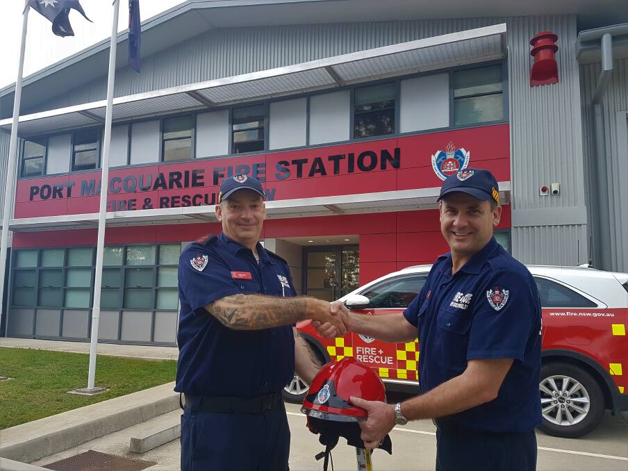 Promoted: New firefighter captain Rob Read with former Port Macquarie retained firefighter captain Damian 'Damo' Buchtmann.