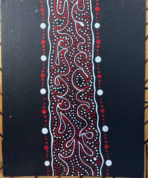 Indigenous artist Tony Clark's striking red and black pattern. Photo taken by Camden Haven Redbacks.