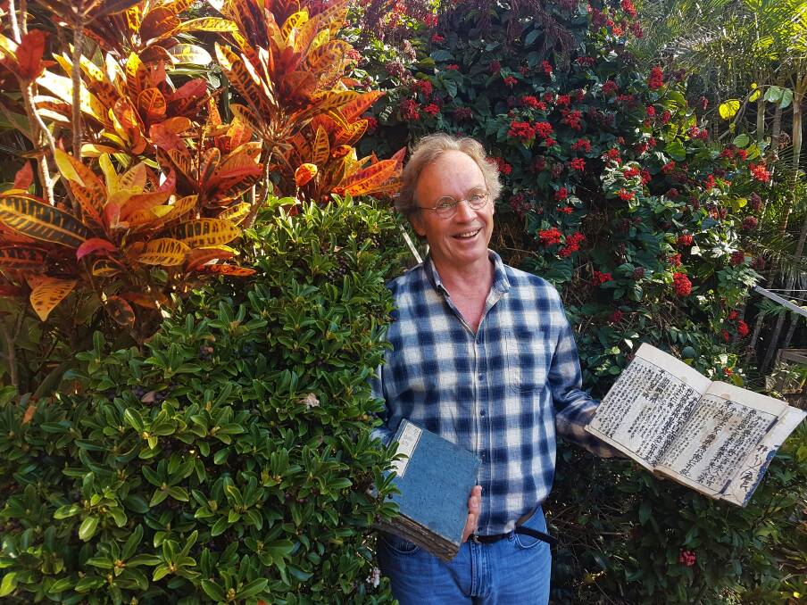 MODERN PHILOSOPHY: Dr Tony Swain with Chinese texts in Port Macquarie.