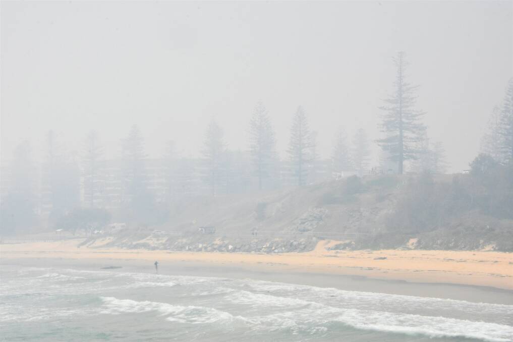SMOKE BLANKET: Smoke clouds billow over Town Beach in Port Macquarie on November 19.