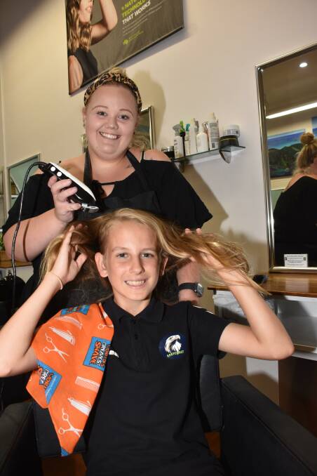 CHOPPING LOCKS: Huntar Lohan with cousin and local hairdresser of ten years, Sophie Cook.