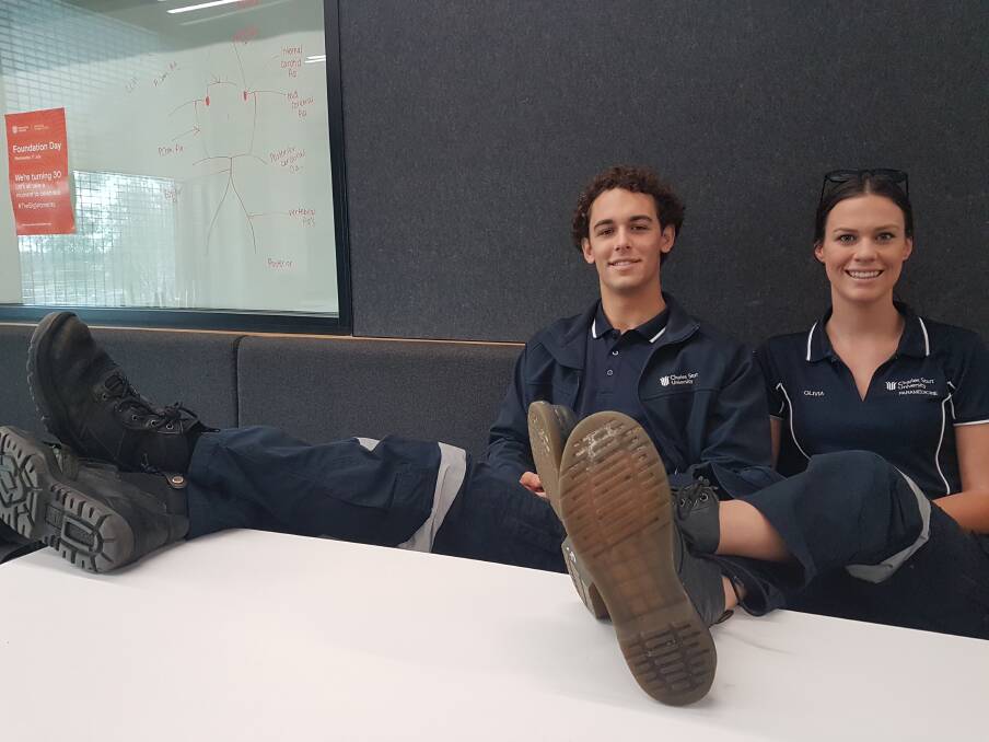 STUDYING ABROAD: Port Macquarie paramedicine students, Angus Laut and Olivia Stuart.