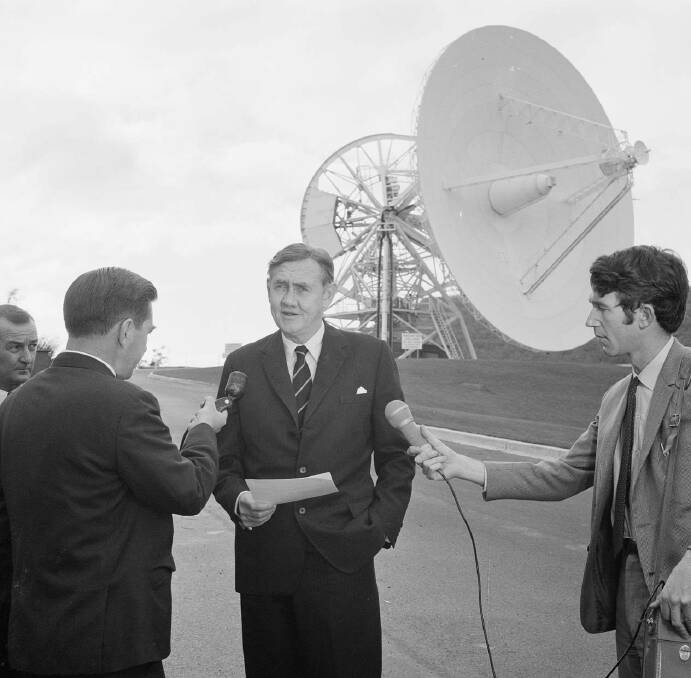 REPORTING: Peter Martin interviewing Prime Minister John Gorton at Honeysuckle Creek tracking station during the Apollo 11 moon landing in 1969. Photo: National Archives of Australia.
