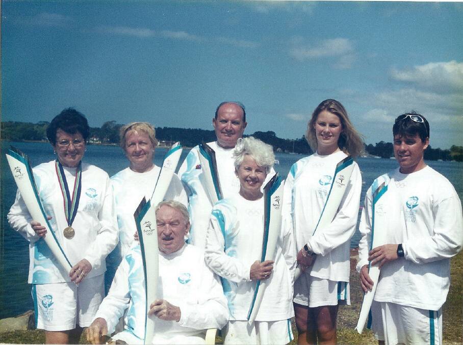 ALL GATHERED: The torchbearers from 2000 including Raymond Chesher (middle,back row).