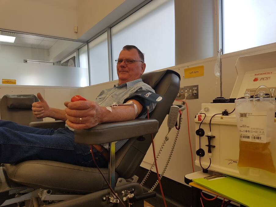 NOT SCARED OF THE NEEDLE: Wauchope's Graham Leahy giving plasma in his 75th donation.