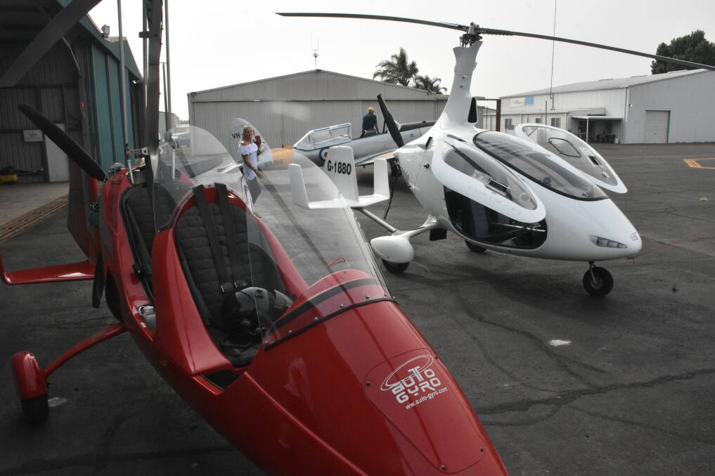 FLIGHT MACHINES: An open and enclosed gyrocopter on show.