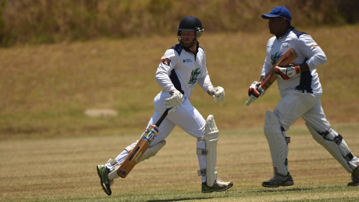Cricket action: Nulla's Daniel Baker and Chris White running between the wickets.