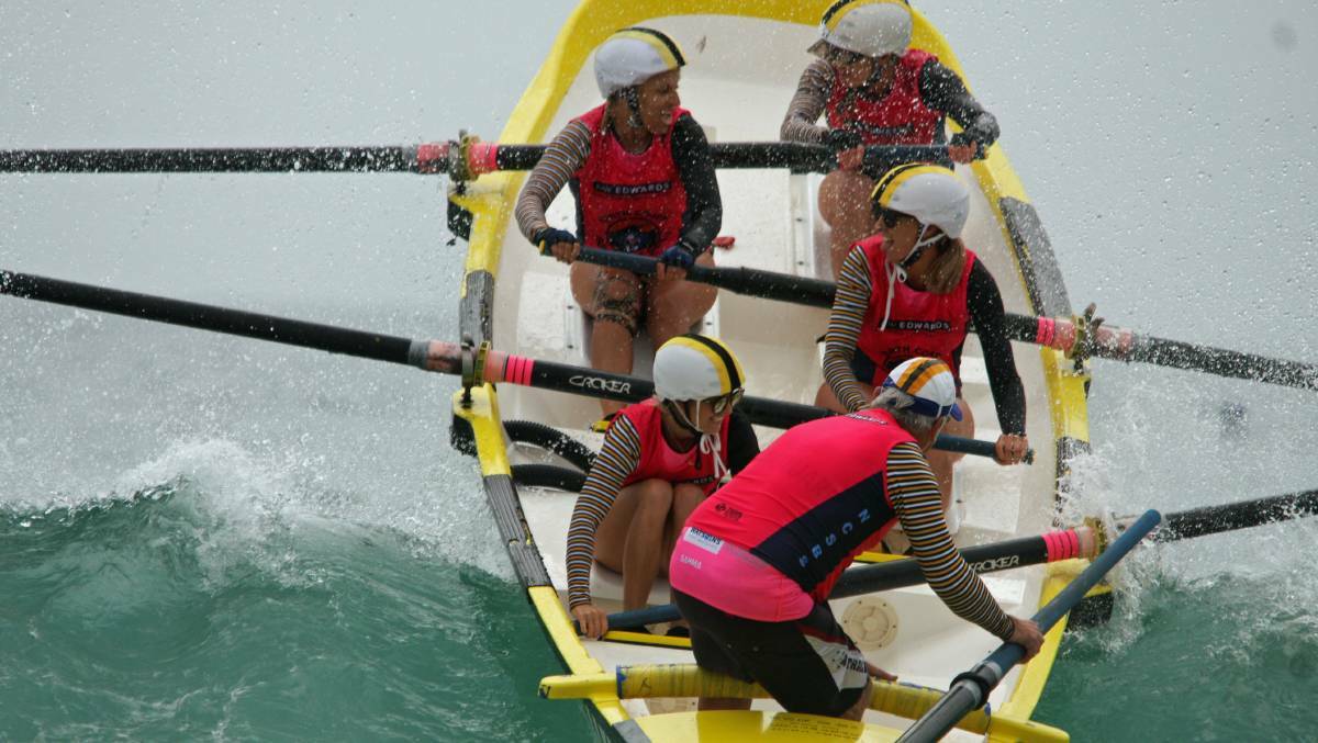 ROUGH SWELL ON THE WAY: The Port Macquarie surf boat women's A grade crew in 2018.