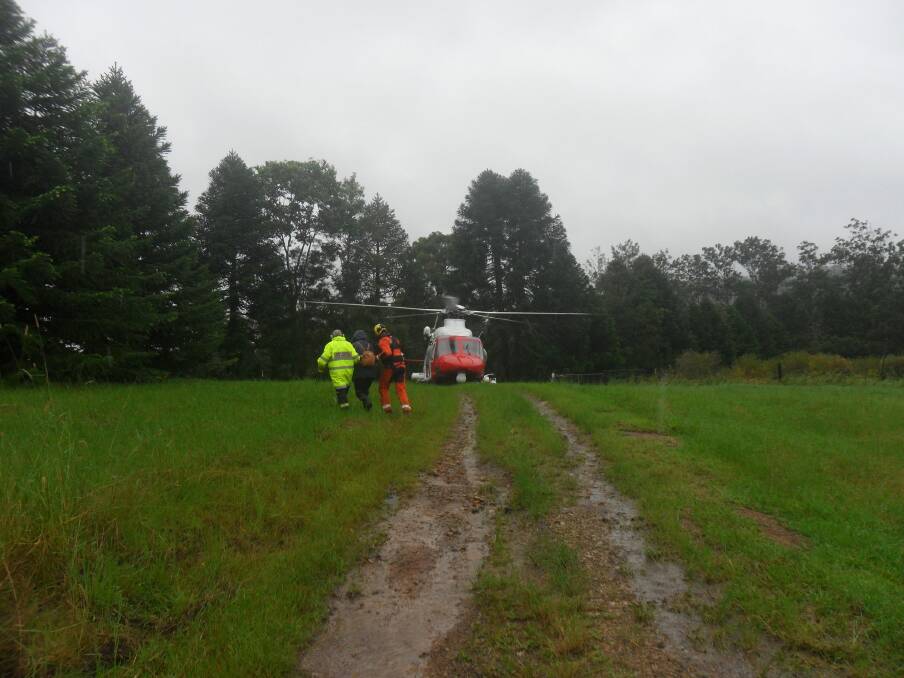 EMERGENCY PICKUP: Janette Jones being airlifted out of Rollands Plains. Photo: Supplied/Neil Jones.
