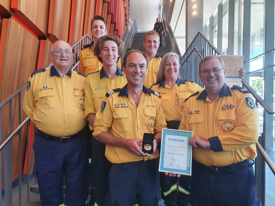 AUSTRALIA DAY AWARD: Captain Chris Brown with members of the Lake Cathie Brigade Rural Fire Brigade.