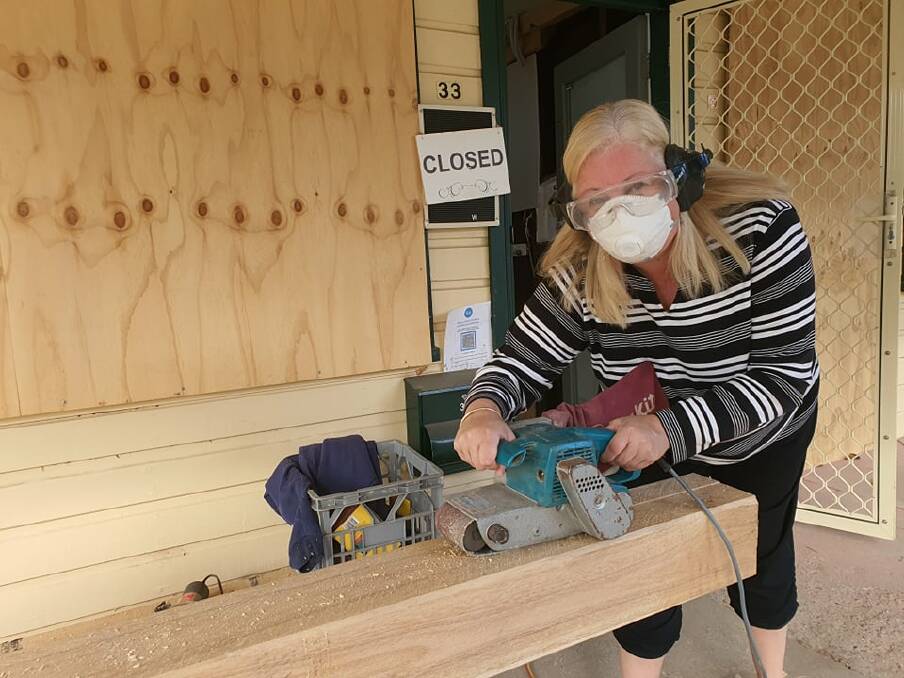ON THE TOOLS: Miss Nellie's Cafe owner Jenelle Nosworthy with a sander.