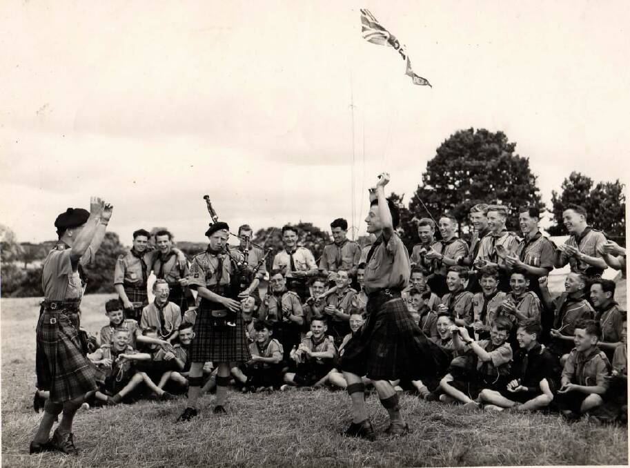 FAMILY TRADITION: Duncan's father Munro Kirkland playing pipes while at a Scout retreat. Photo: Supplied/HSC