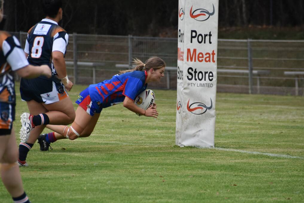 TRY ON THE LINE: Captain Larissa Ward scores a try for Wauchope.
