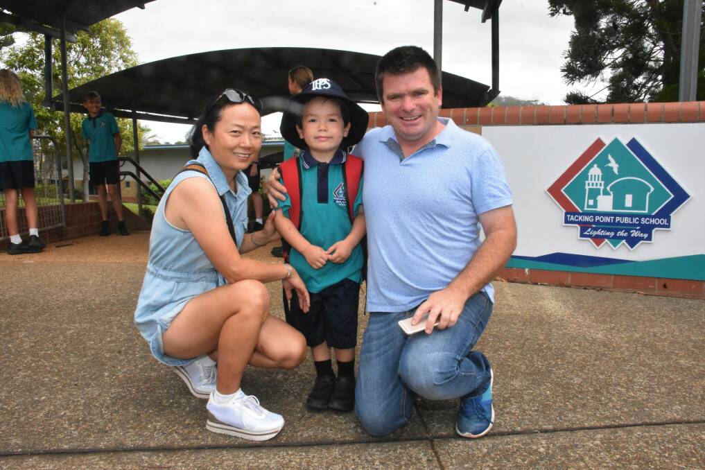 FIRST DAY: Anthony Hopfe and Lili Chen with son, Justin at Tacking Point Public School.