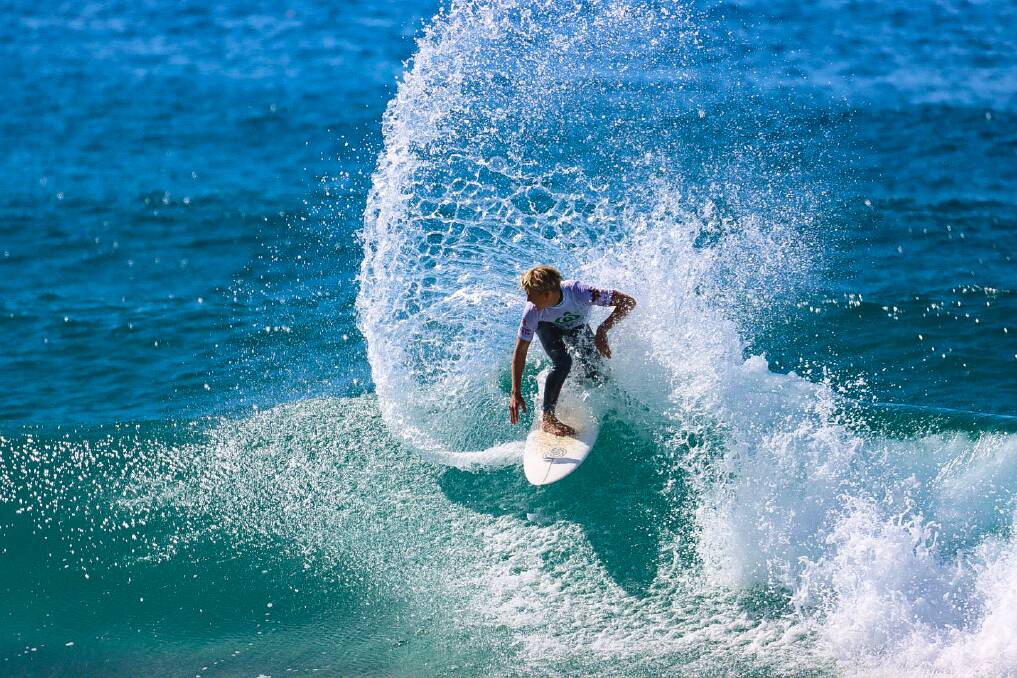 SHREDDING WAVES: Kayle Enfield surfing in the NSW Junior Titles. Photo: Supplied/Kurt Polock.