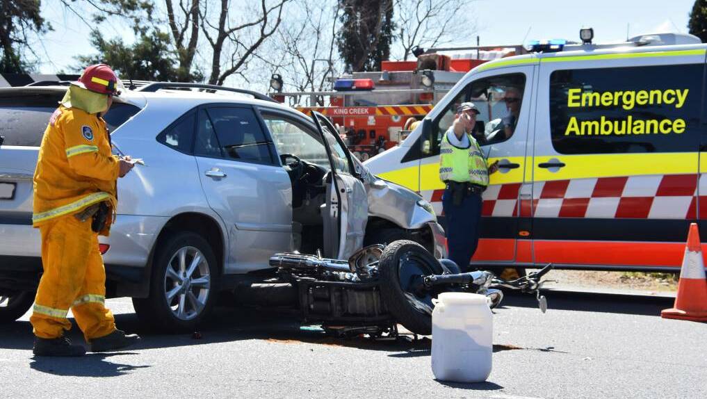 Crash scene: Police investigating a crash involving a motor vehicle and a motorcyclist on the Oxley Highway at King Creek Road on Monday, September 11, 2017. Photo: Ivan Sajko.