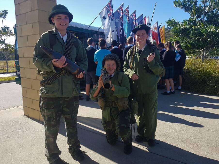 Equipped for combat: Port Macquarie students Sharnie Kilmore, 14, Cody Boland, 14 and Ashely Garth, 15.