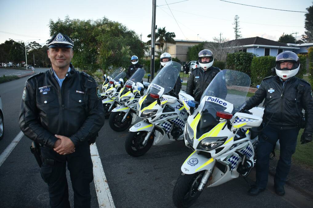On the roads: Sergeant Paul Apap with Traffic Support Group officers.
