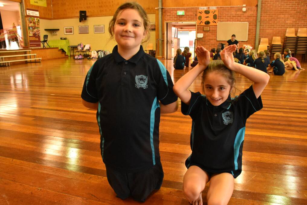 DANCING STUDENTS: Year four student Alice Souter and year three student Bella Galati.