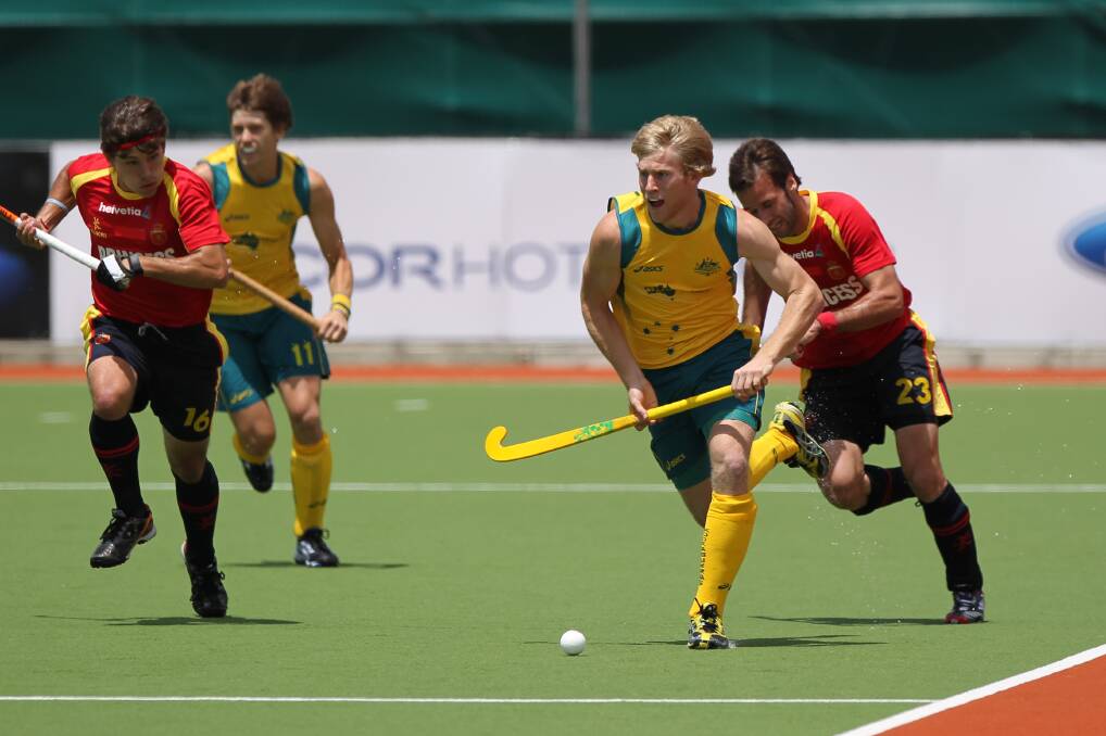 CHARGE ON: Matthew Butturini competing in the 2011 Champions Trophy. Photo: Supplied/Hockey Australia