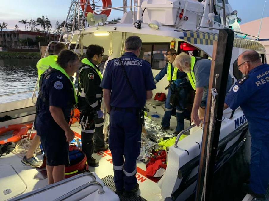 LUCKY TO BE ALIVE: Marine Rescue Port Macquarie, paramedics and the Westpac Rescue Helicopter during the rescue. PHOTO: Marine Rescue Port Macquarie.