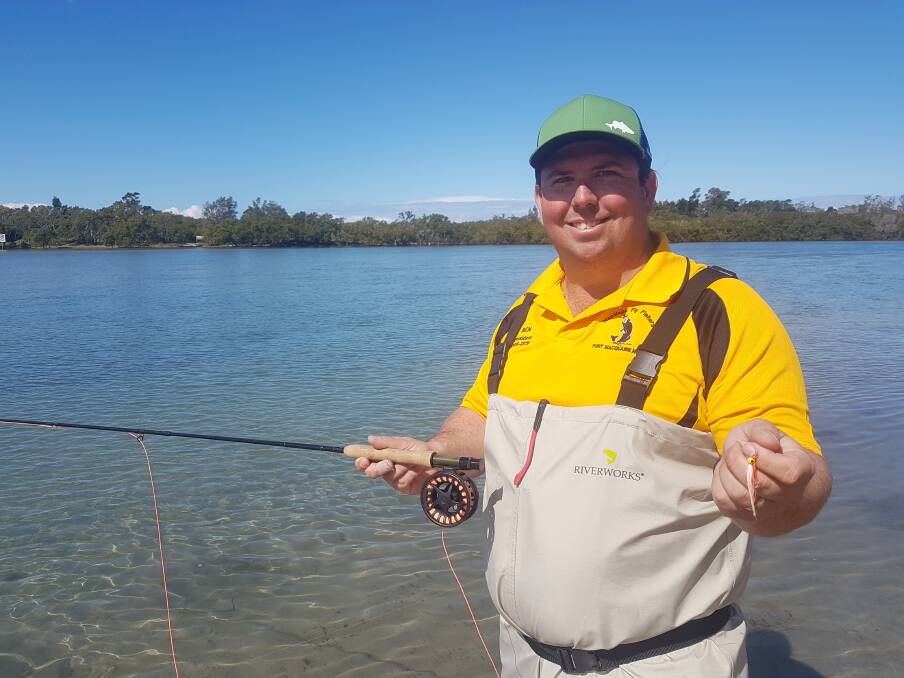 WADING IN: Port Macquarie angler Ben Harvey casting a fly at Settlement Point.